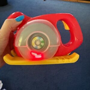 Tool toy , Sabre Saw , spins , makes noise , works,lights up , works